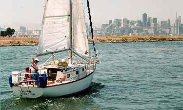 A Cape Dory sailboat and the San Francisco skyline